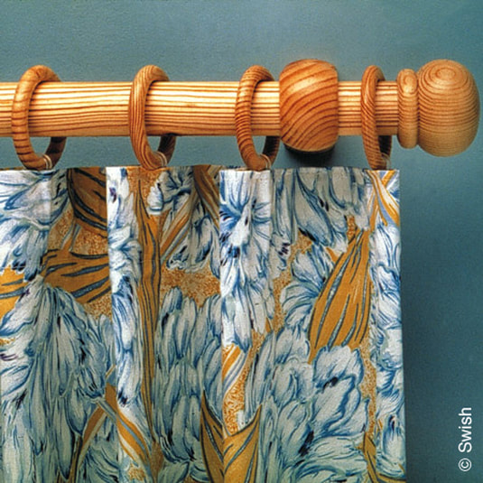 PhotoVotre finition haut de rideau: choisissez un style rustique avec des anneaux de bois